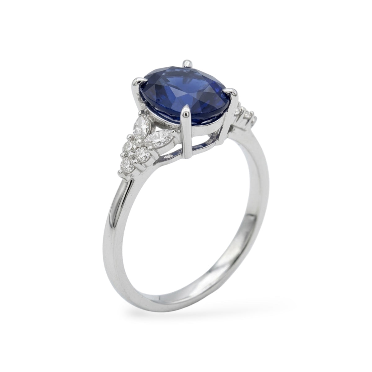 AMI079B Oval Cut Lab-Grown Blue Sapphire Sidestone Ring