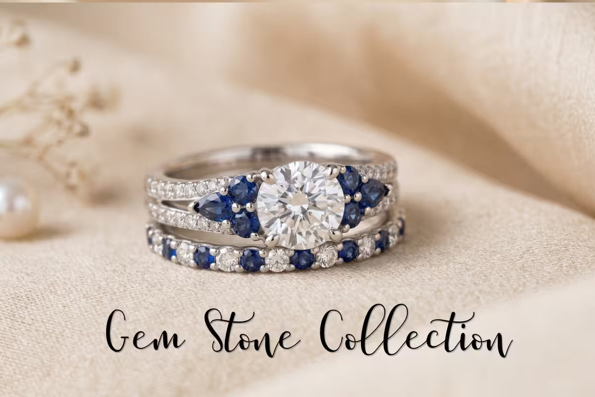 Stack of diamond and sapphire rings on a beige fabric background with 'Gem Stone Collection' text.